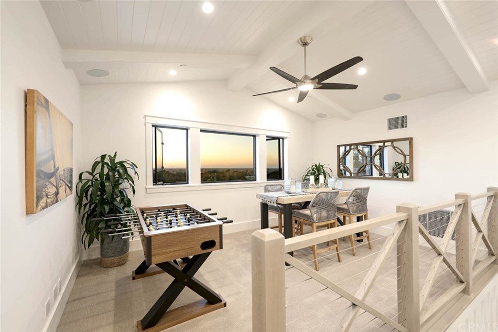 Los Alamitos electrician installing ceiling fan